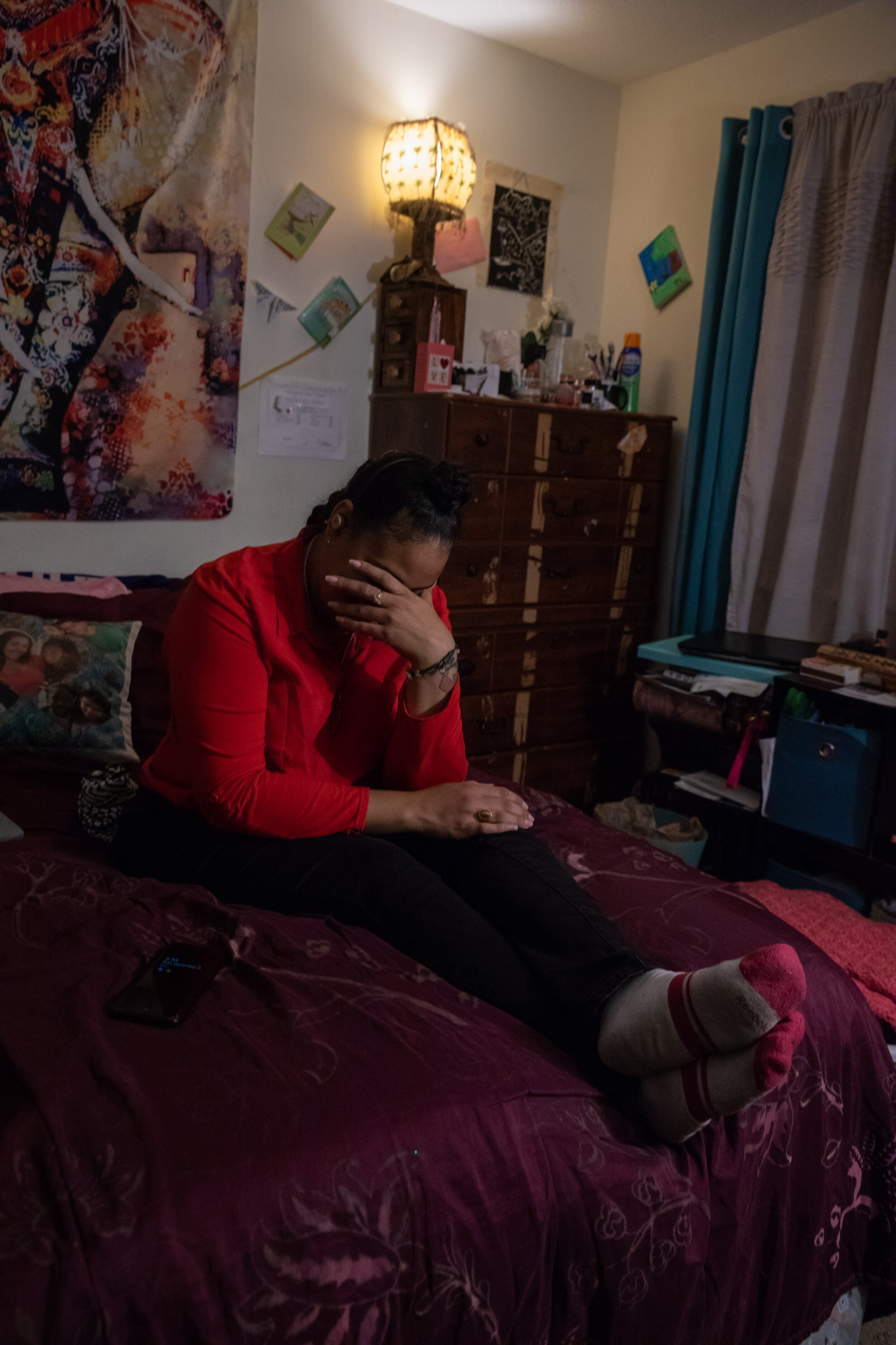  Nawaal Walker sits on her bed in her home in Durham, North Carolina, on Dec. 6, 2020. The global COVID-19 pandemic has exacerbated and magnified the eviction crisis, especially for women of color. (For  HuffPost )  