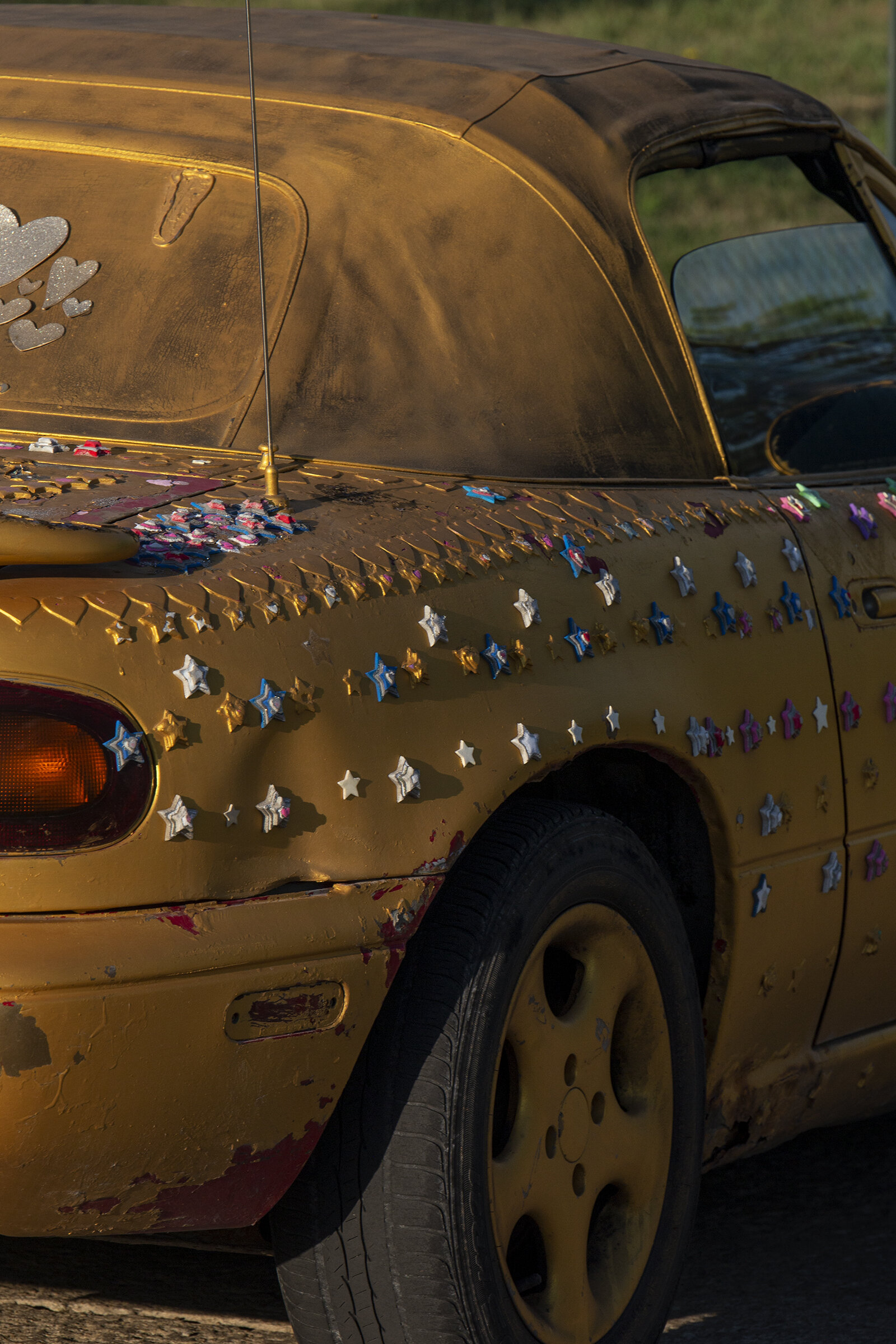  A car in a lot at Maharishi International University, Fairfield. The university employs consciousness-based education, including the teaching of the Transcendental Meditation technique. (Jefferson County) 