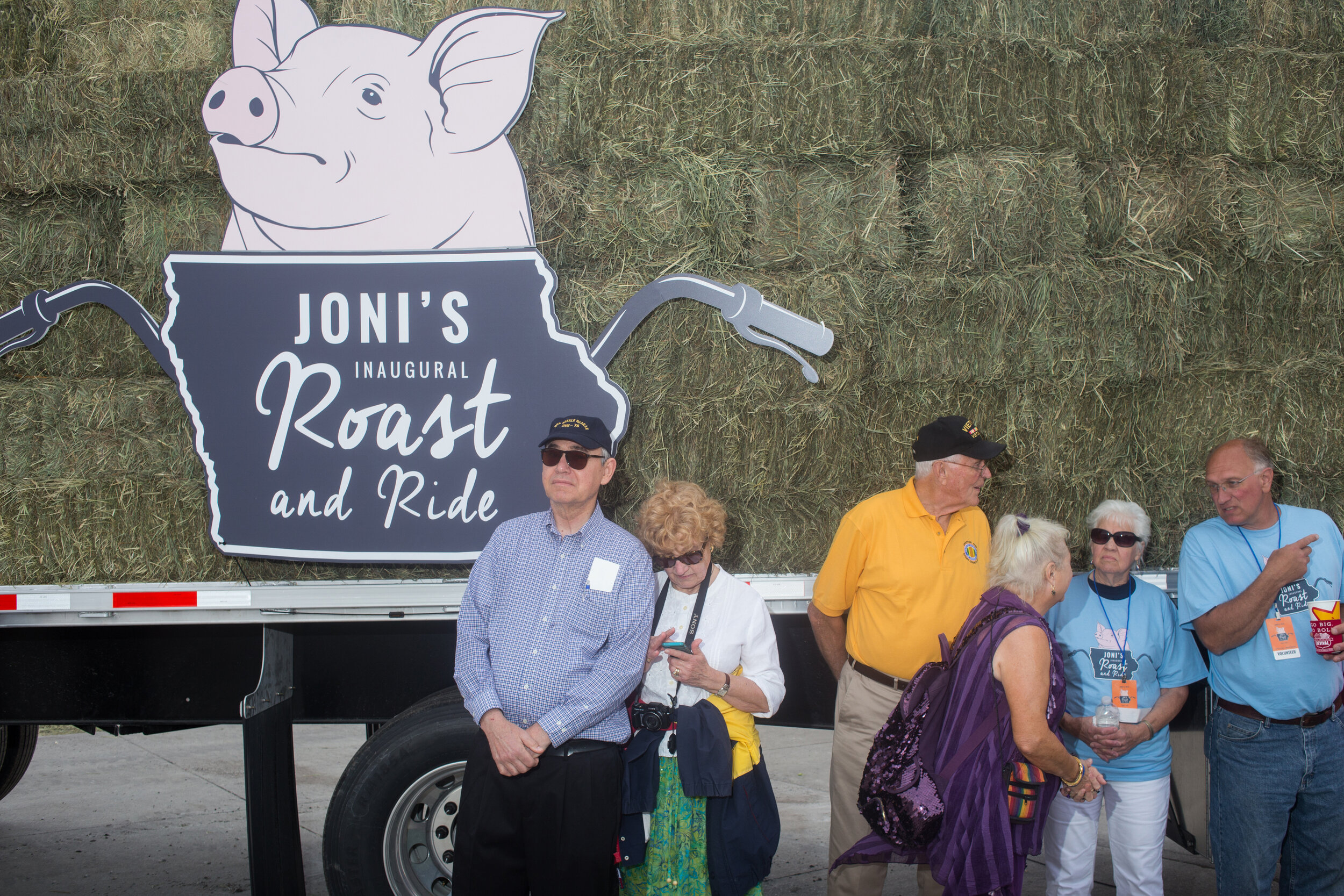  Attendees stand around at Senator Joni Ernst's First Annual Roast &amp; Ride on June 6, 2015 in Boone, Iowa.  