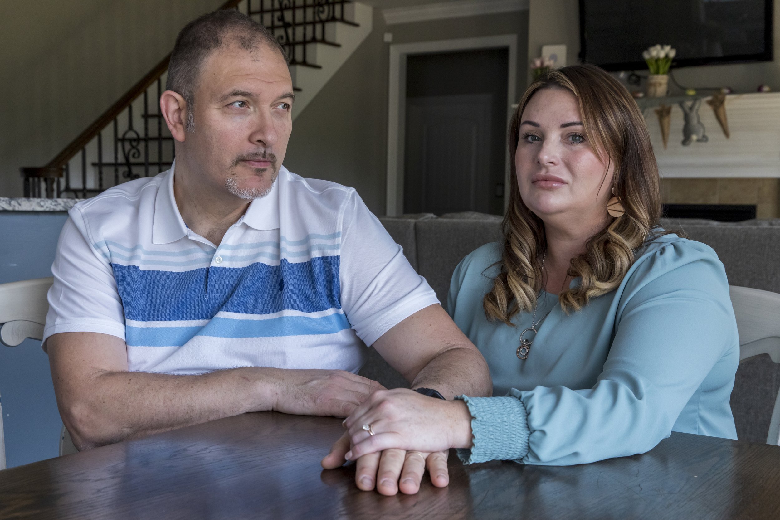  Gino and Lisa Carannante sit at the dining room table in their home in Burlington, NC on Monday, March 27, 2023.   This image was made for Bloomberg for a story about weight loss drugs like Wegovy and Ozempic. 