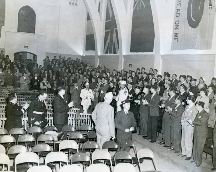 A new member induction ceremony in the post auditorium in the 1940s.