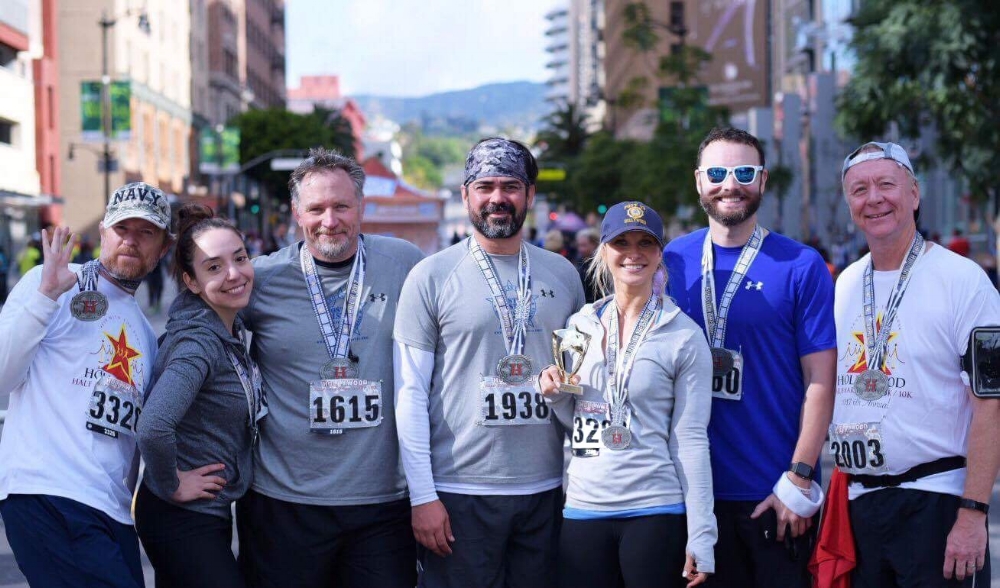Congratulations to our Post 43 Running Team for finishing the 2017 Hollywood Half Marathon/10K/5K! This is the fourth year the Sports Committee sponsors runners from the post to participate in this great race right in our community. From L ro R: Matt Skomo, Fernanda Miranda, Karl Risinger, Jeric Wilhelmsen, Jennifer Campbell, Mark Harper, Pat Birman (photo by Shannon Corbeil)