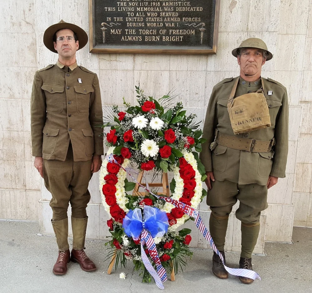 Two reenactors pose with a wreath dedicated to the war dead of WWI at the L.A. Memorial Coliseum, April 6, 2017. Post 43 is raising money to restore and preserve a WWI memorial at Elysian Park. To learn more and to donate, CLICK HERE .