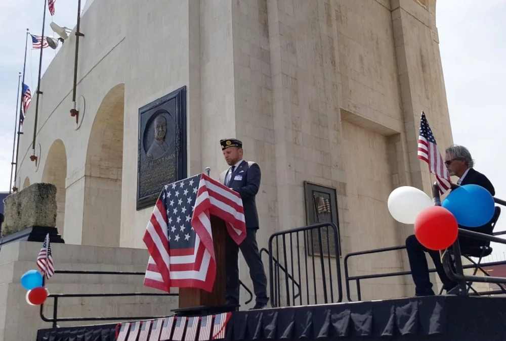 Post 43 2nd Vice Commander, Michael Hjelmstad addresses the audience at the Los Angeles Memorial Coliseum during a ceremony commemorating the 100th anniversary of the United States' entry into World War One, April 6, 2017. (photo by Dennis Kee)