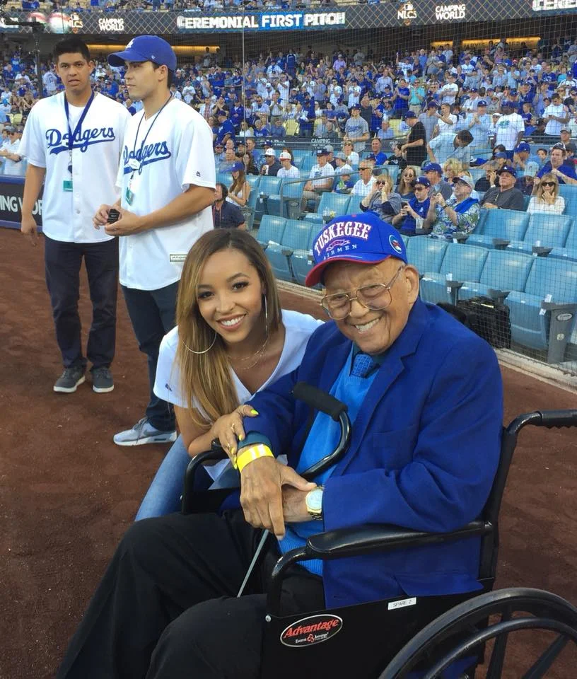 WWII Veteran, legendary Tuskeegee Airman, and Post 43 Honorary Life Member, Lt. Col. Robert Friend, pictured here with National Anthem vocalist Tinashe, was honored as Hero of the Game at the Los Angeles Dodgers NLCS Game 2, Oct. 15, 2017. (photo courtesy Greg Alaimo)