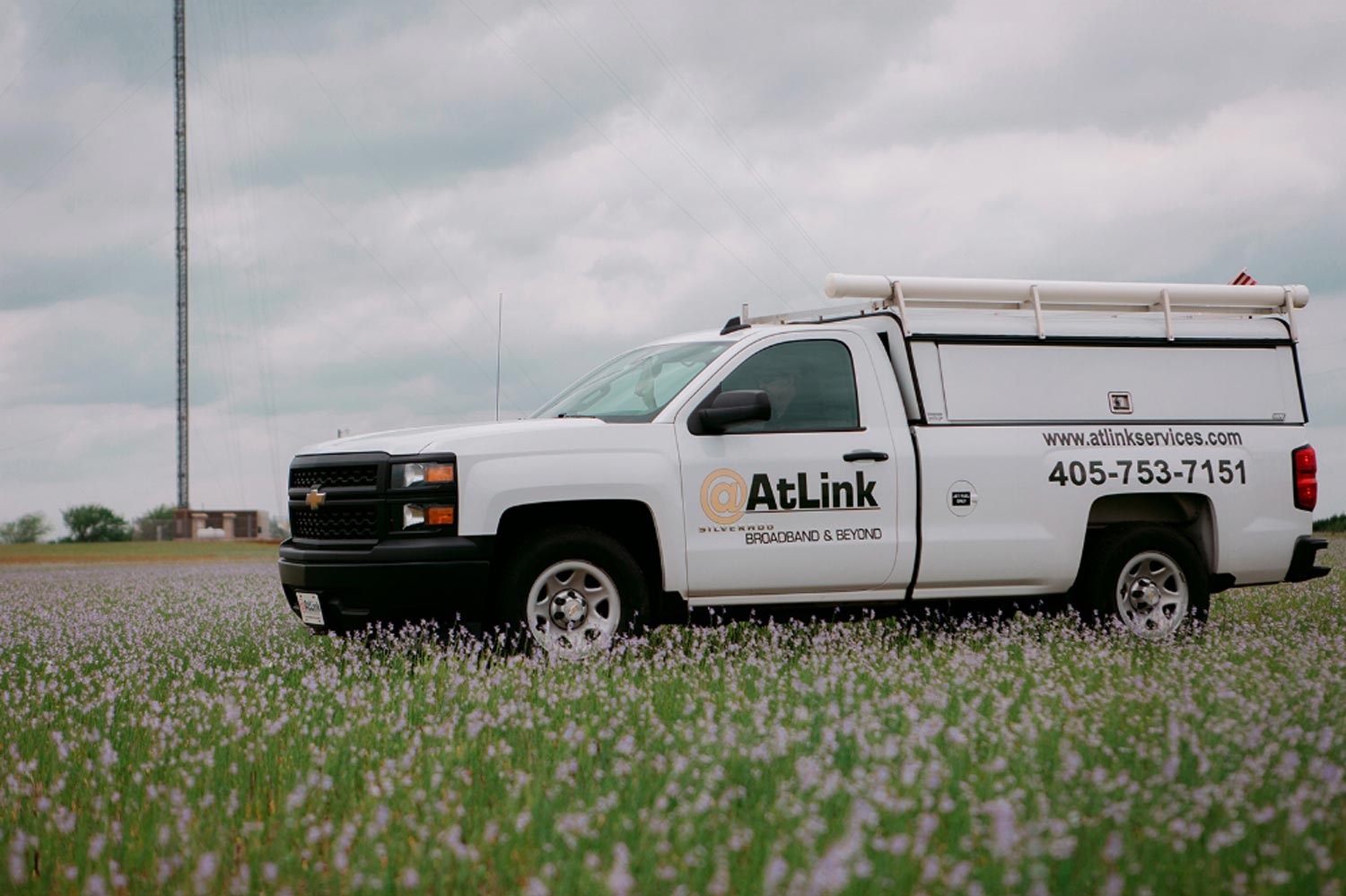 AtLink-service-truck-in-a-field.jpg