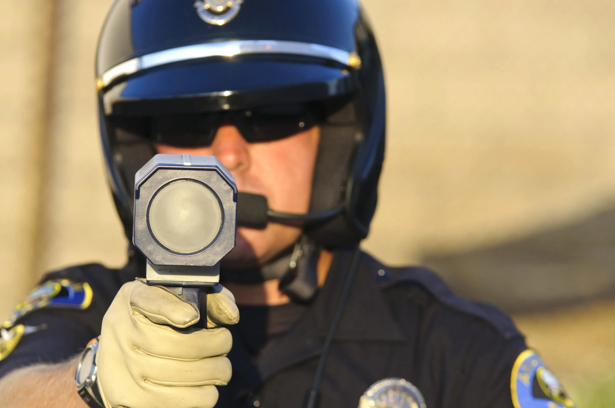 shutterstock_cop-pointing-radar-gun.jpg