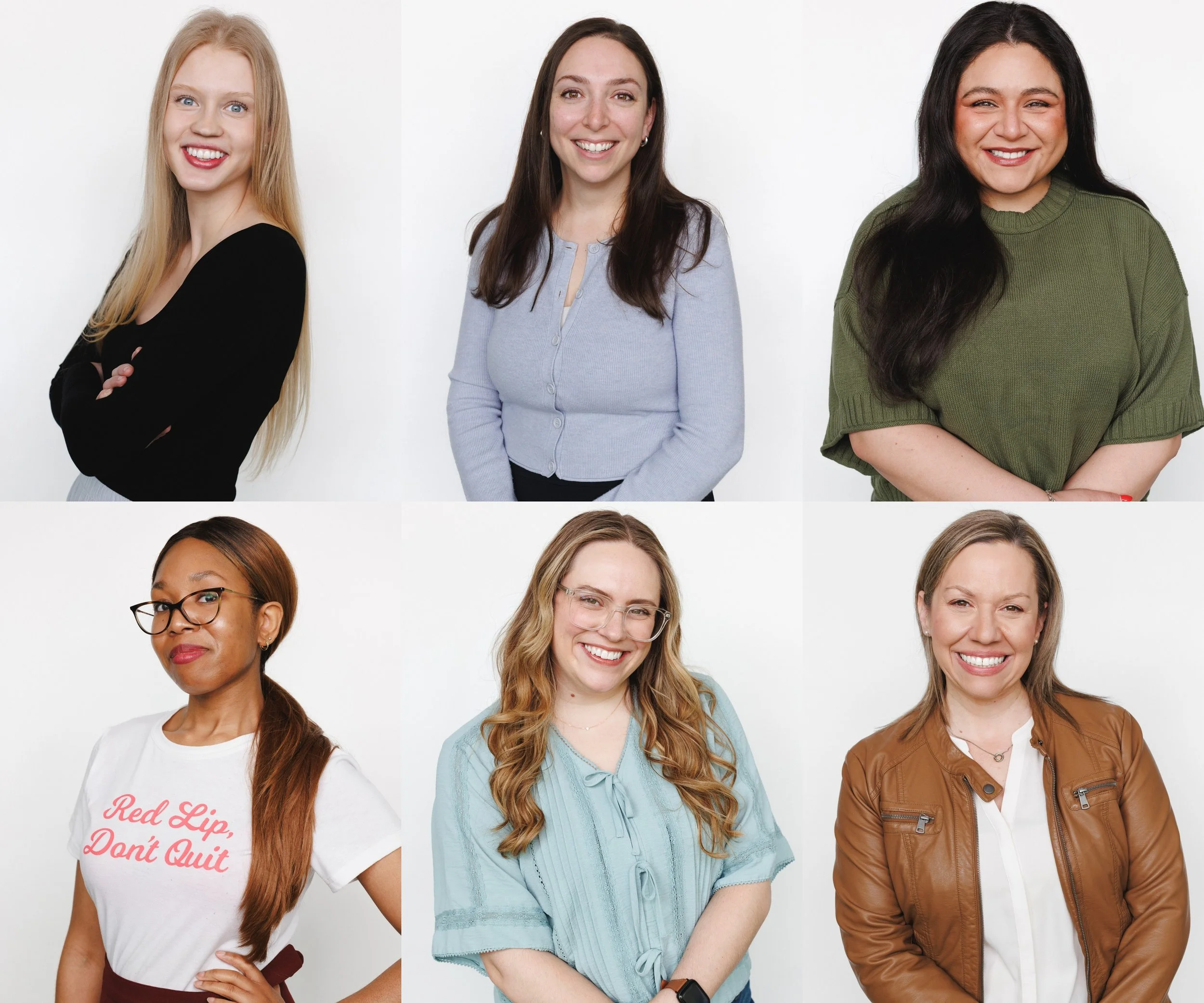 six women with diverse appearances and hairstyles, smiling and posing against a white background.