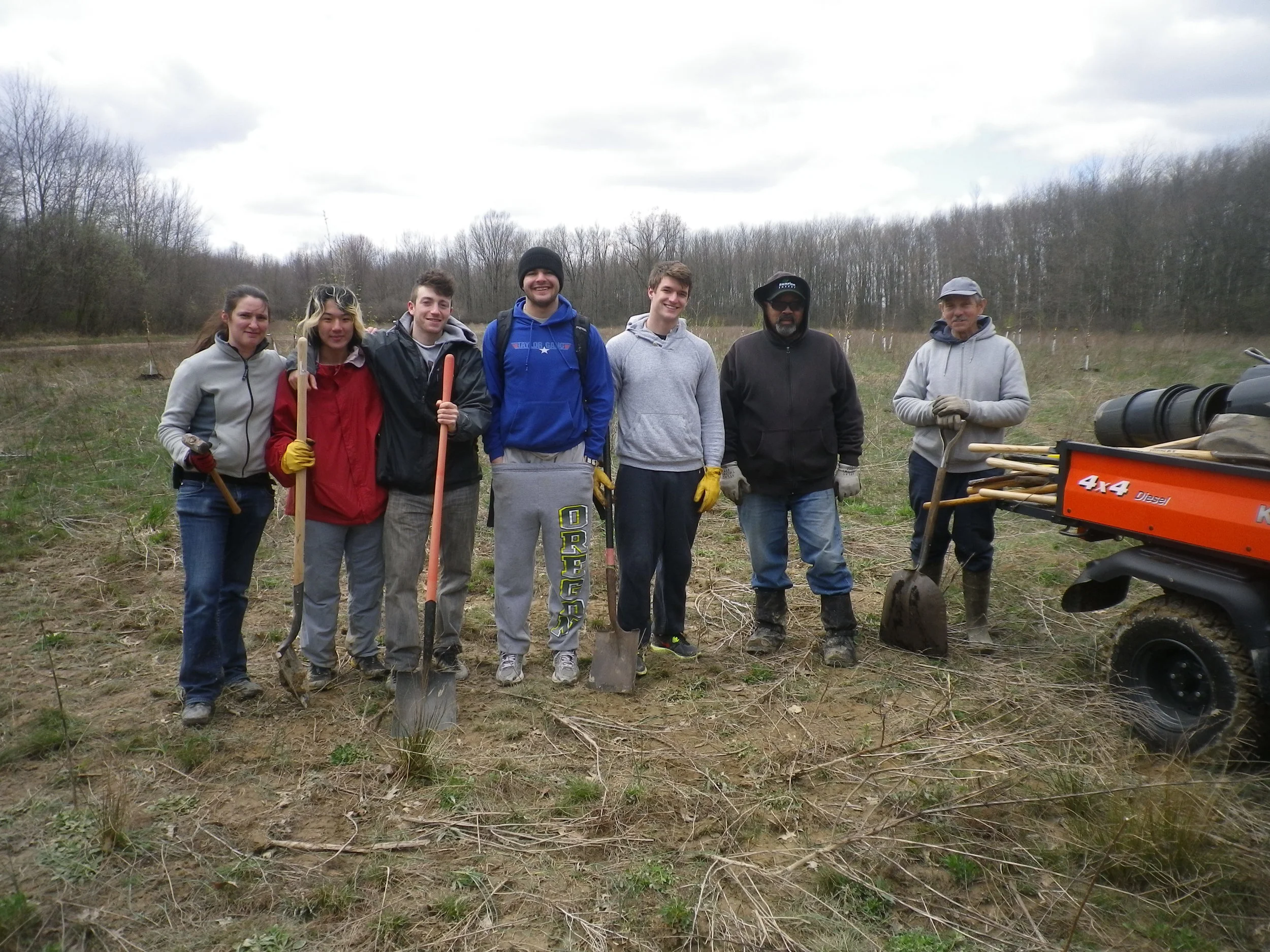Student project organizers, volunteers and Oberlin College Grounds Staff planted trees to initiate the Afforestation Project.