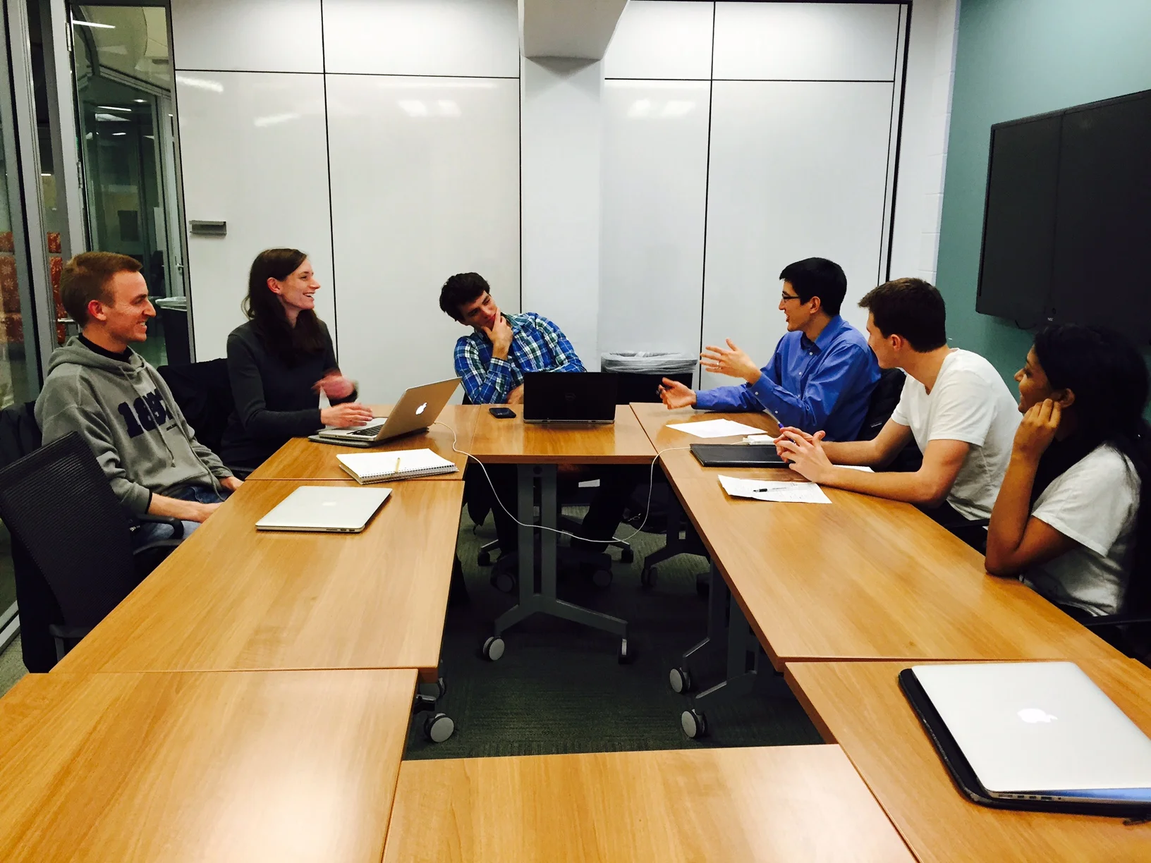 Students and staff at Duke University discuss carbon offset project development strategies.