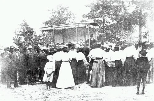 Carver’s Jessup Wagon being used to give field demonstrations. Photo is courtesy of Tuskegee University Archives and the National Archives and Records Administration.
