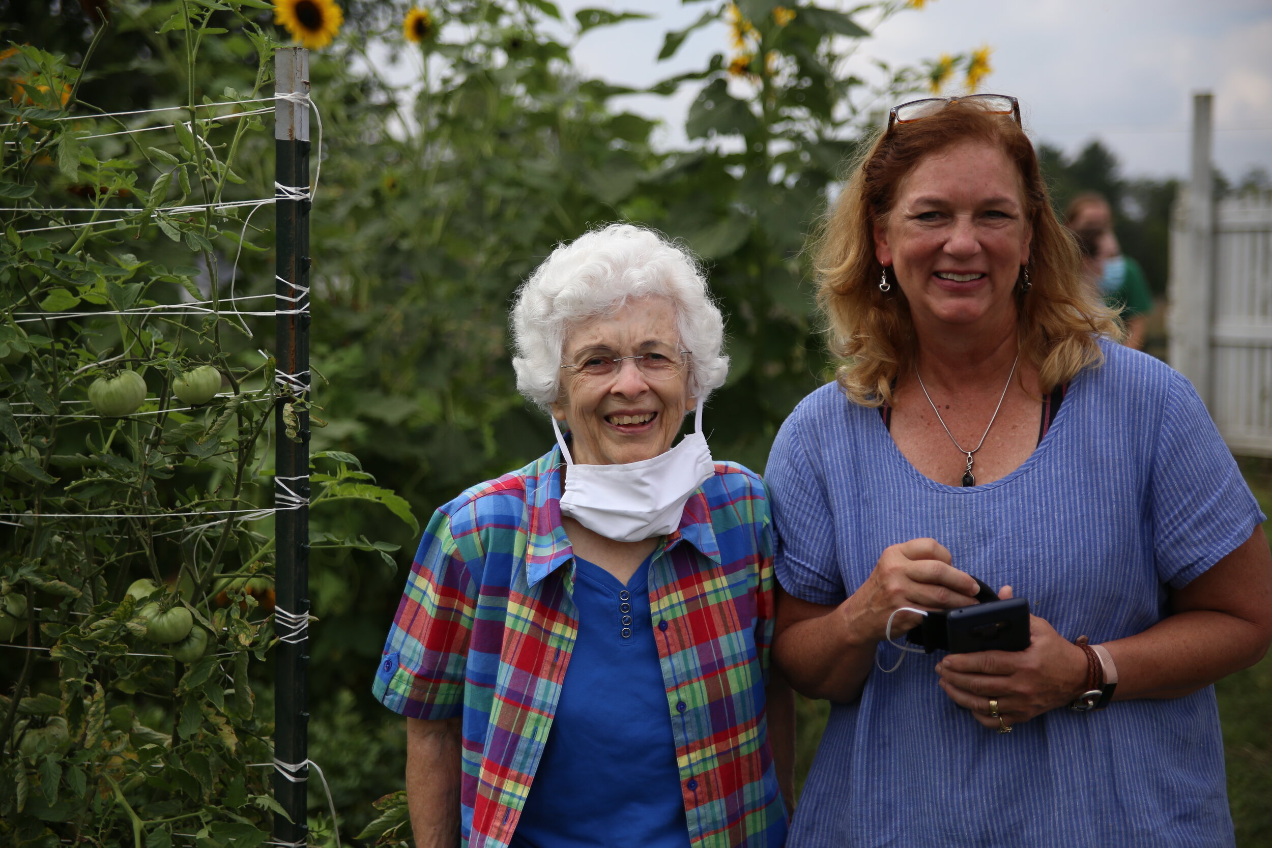  Kathryn Gemmer and her mother, Kathleen (left) visited the BCCF in August to see the crops grown from the seeds they have shared with the farm.  