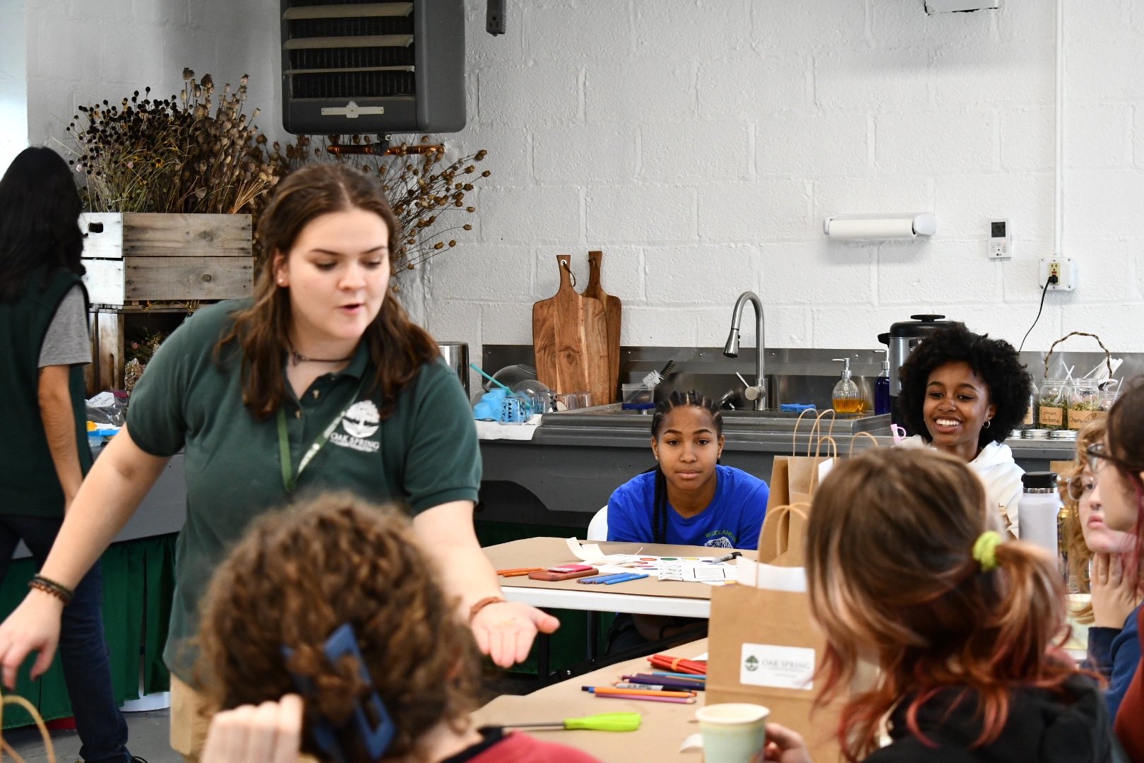 Caitlin and students smiling.JPG