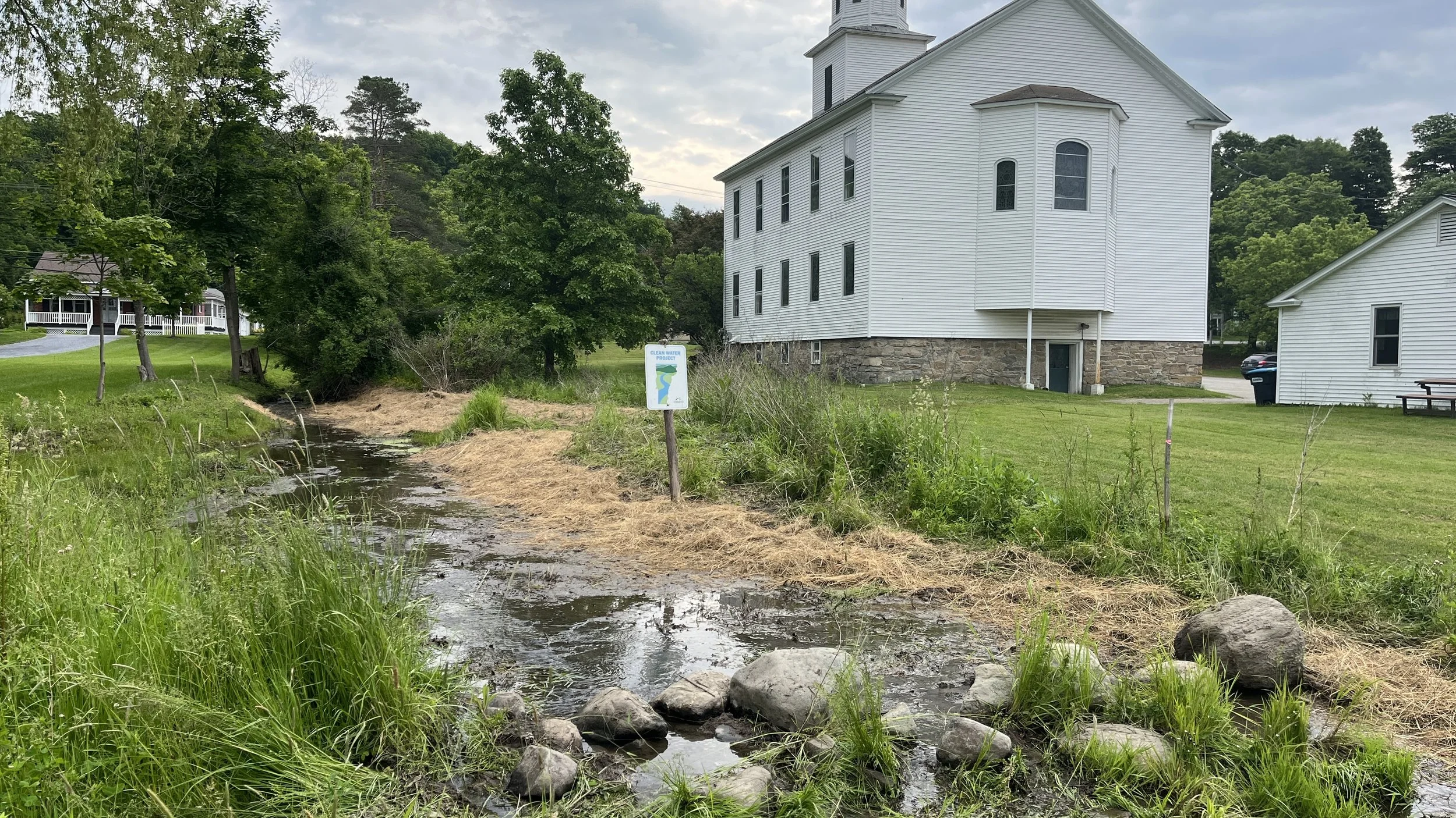 Berm removed and water flowing through swale (looking upstream)