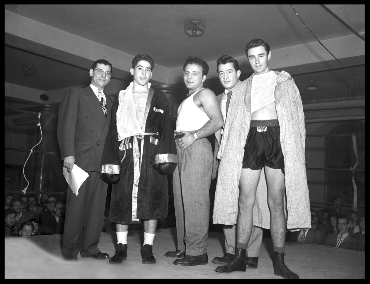 "The Raging Bulls" center Jake LaMotta,middle right Rocky Graziano , middle left Joey LaMotta c.1948 from original 4x5 negative