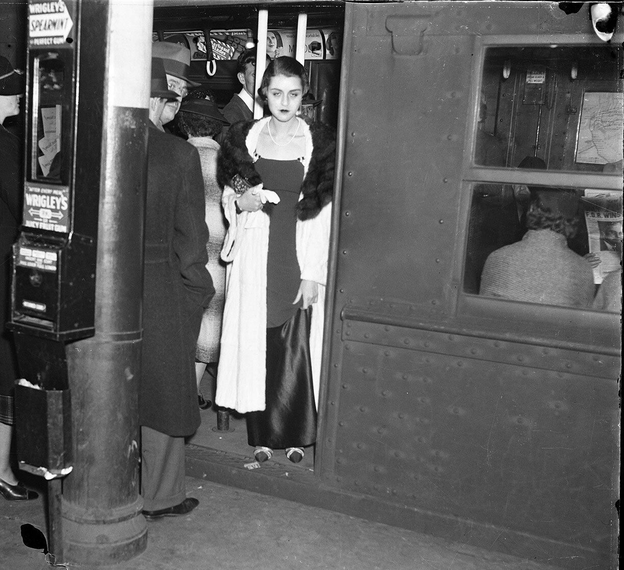 Woman in Thought on Subway c.1932 original 4x5 negative, Notice newspaper in window. F.D.R. Wins Election