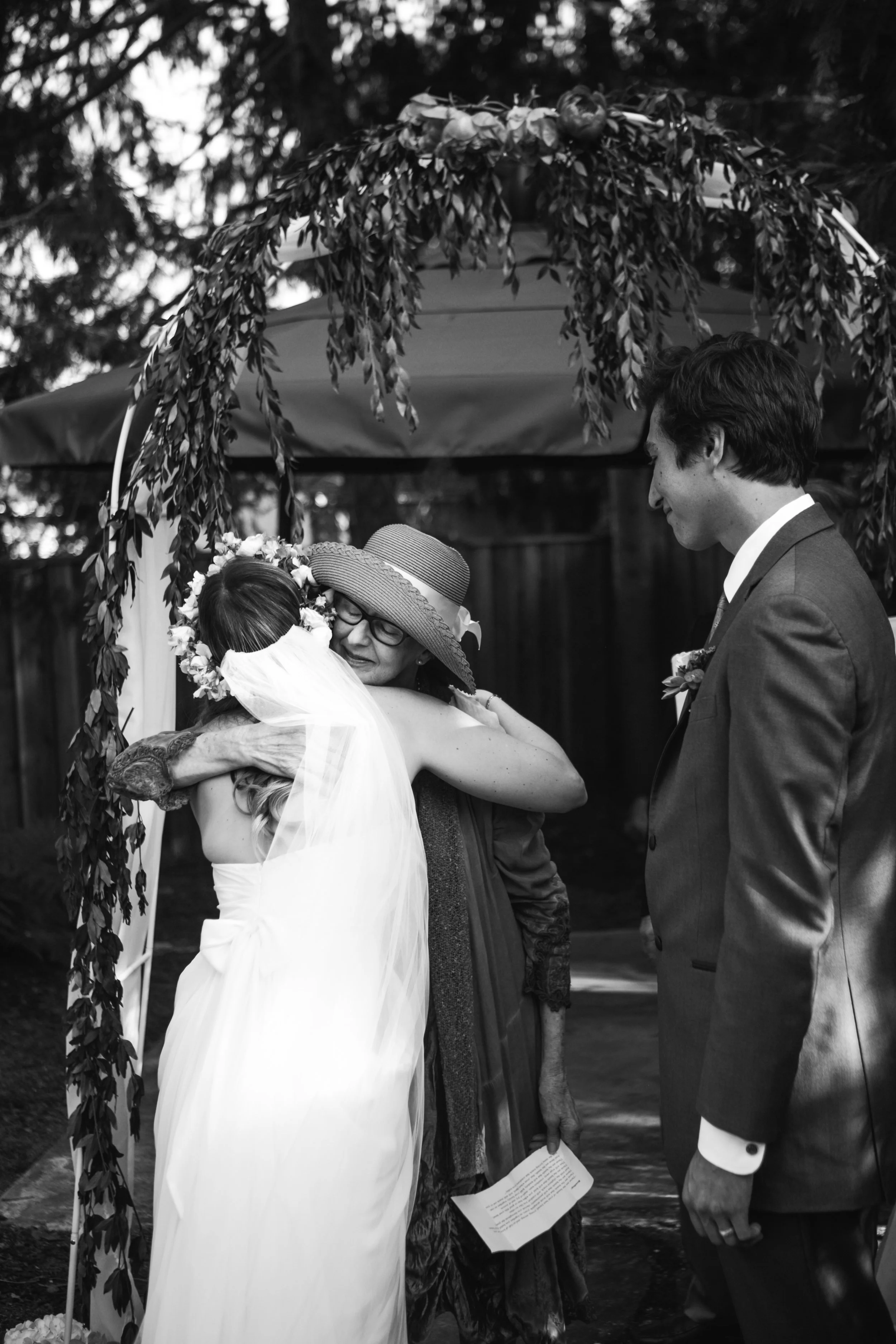 My mom hugging my sister after reading a poem during the ceremony.