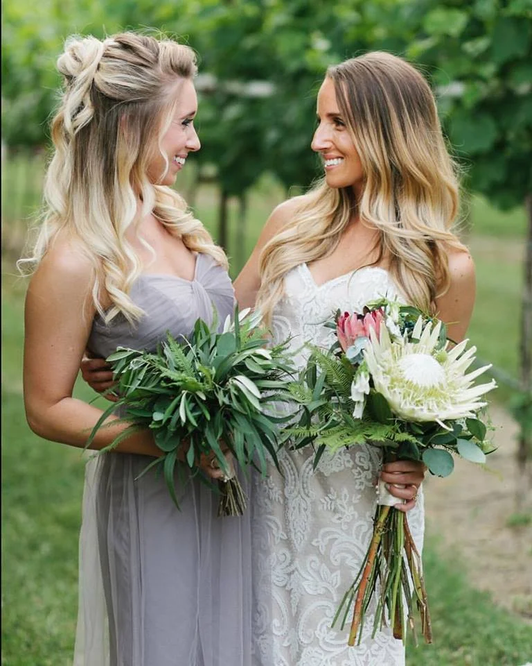 “Having Taylor be part of the best day of my life was absolutely the best decision. She invested so much time and thought into my wedding day, which made working with her a dream. She did all 6 of my bridesmaid hair, 2 flower girls, and of course my hair. She completely understood my vision of simplicity and executed it perfectly. I can't imagine what it would have been like without her while getting ready for my most favorite day of my life. I feel like I had known her for years and she was part of the squad from day one. If you want a sweet, caring, and amazing hair stylist, you must work with Taylor. Taylor, thank you for being part of my wedding day. You are the best!” - Lauren