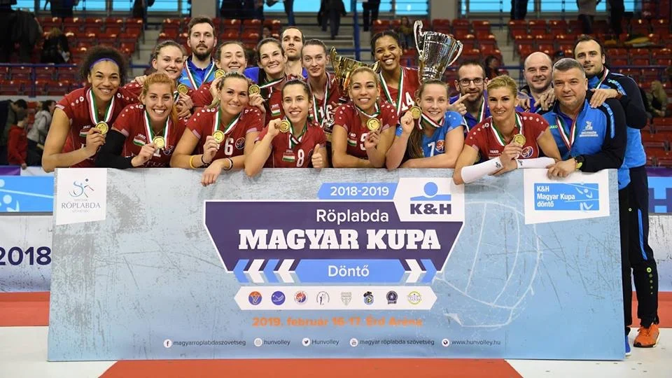 Nyiregyhaza Women take a photo with their medals and Cup.