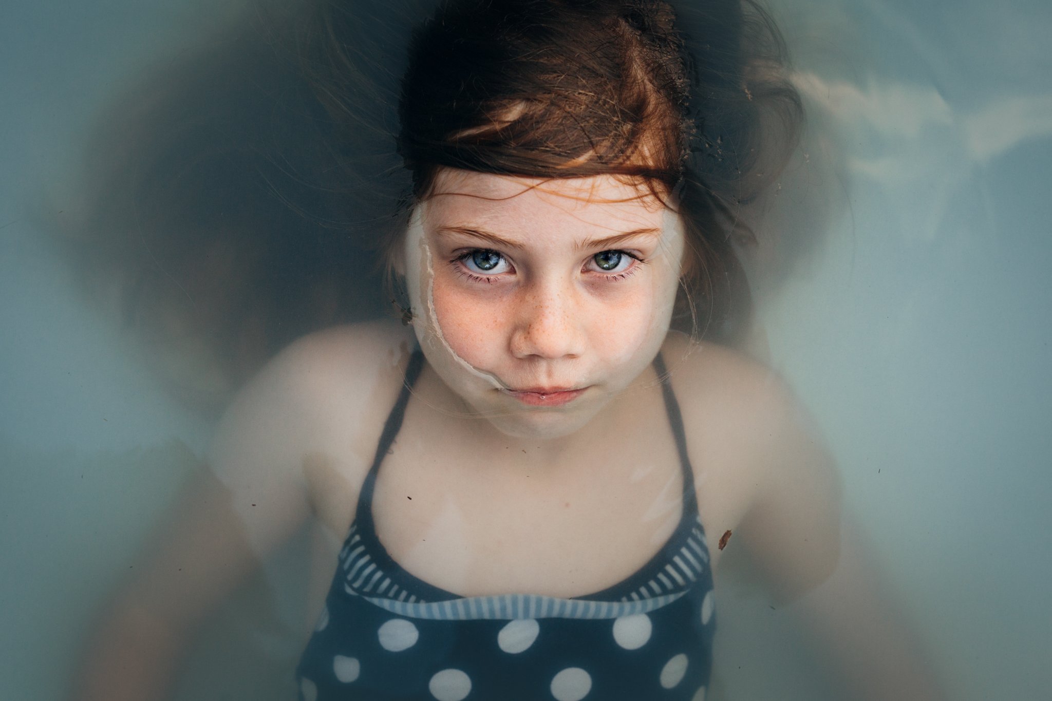 Portrait of girl in pool