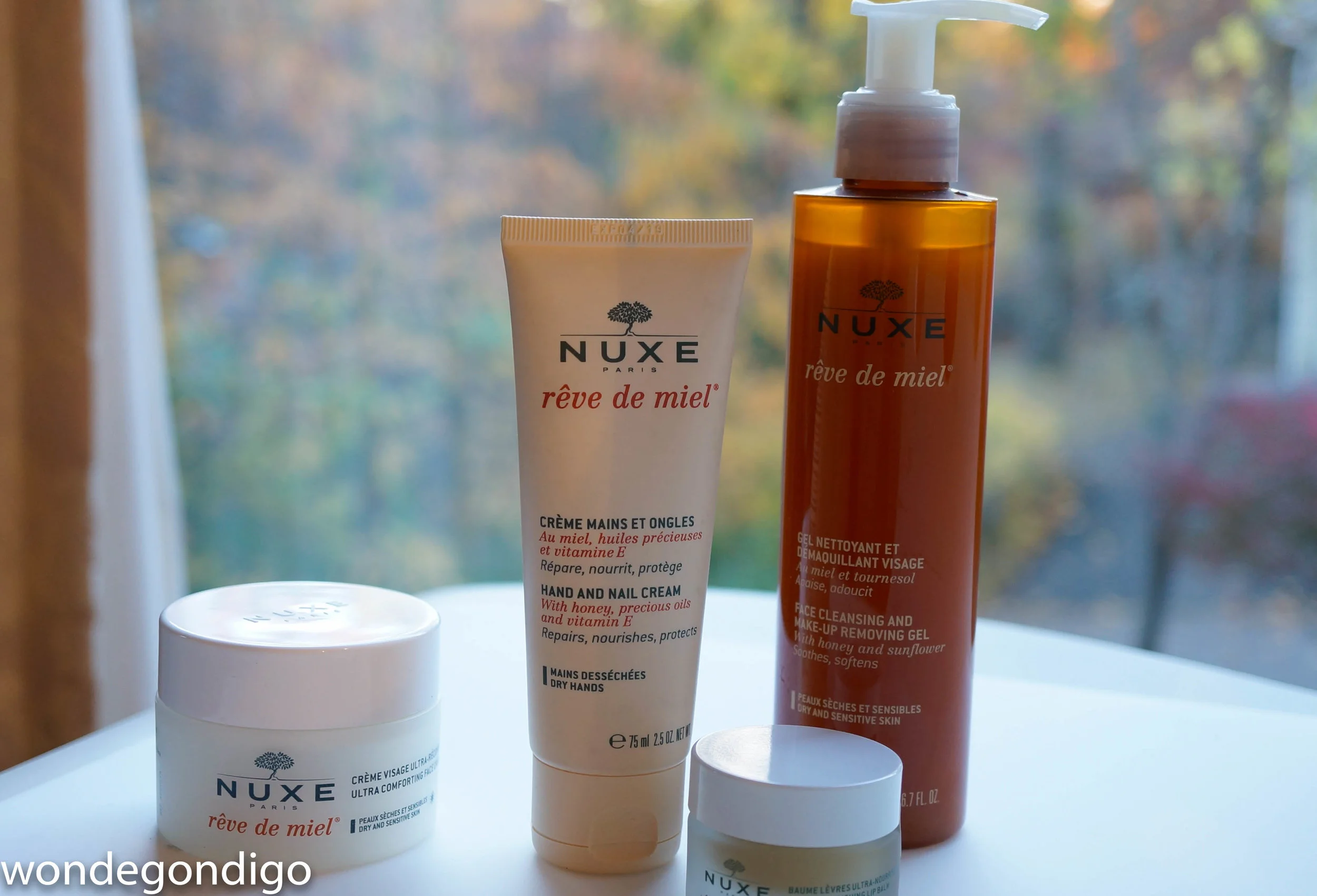 From L to R: Reve de Miel Nourishing Day Cream, RdM Hand and Nail Cream, RdM Lip Balm and RdM Makeup Remover and Facial Cleansing Gel