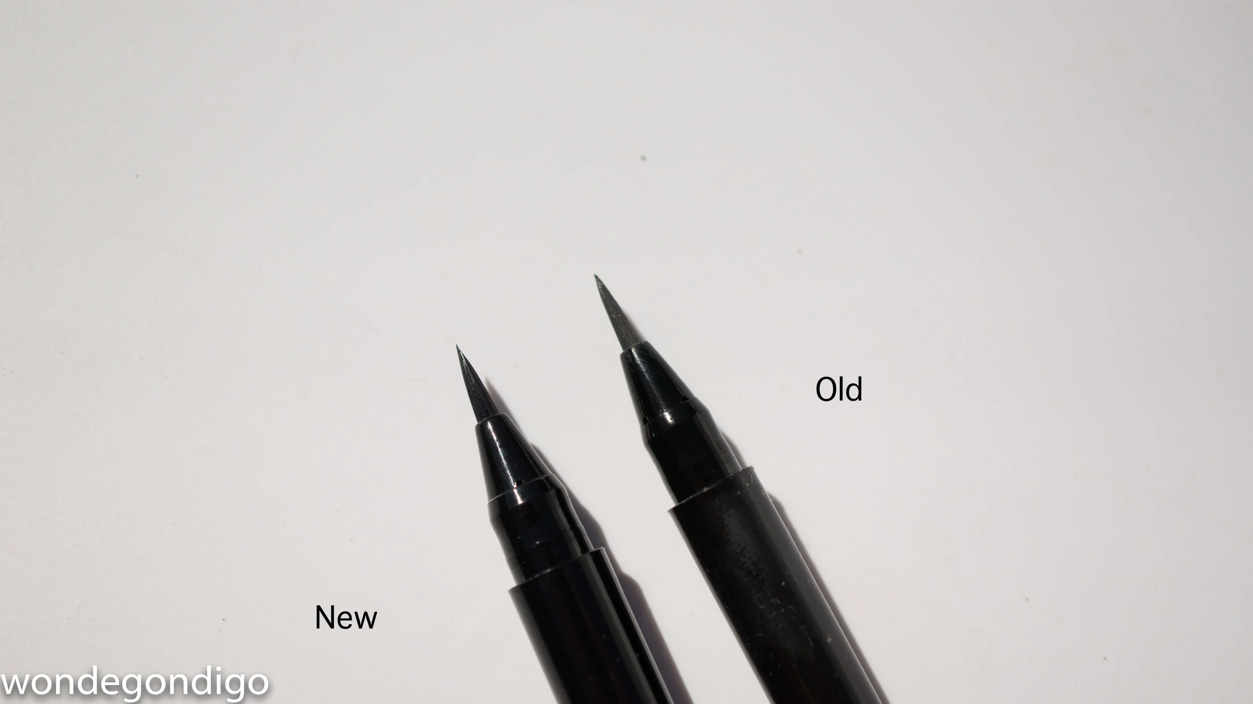 both are fine tipped brushes