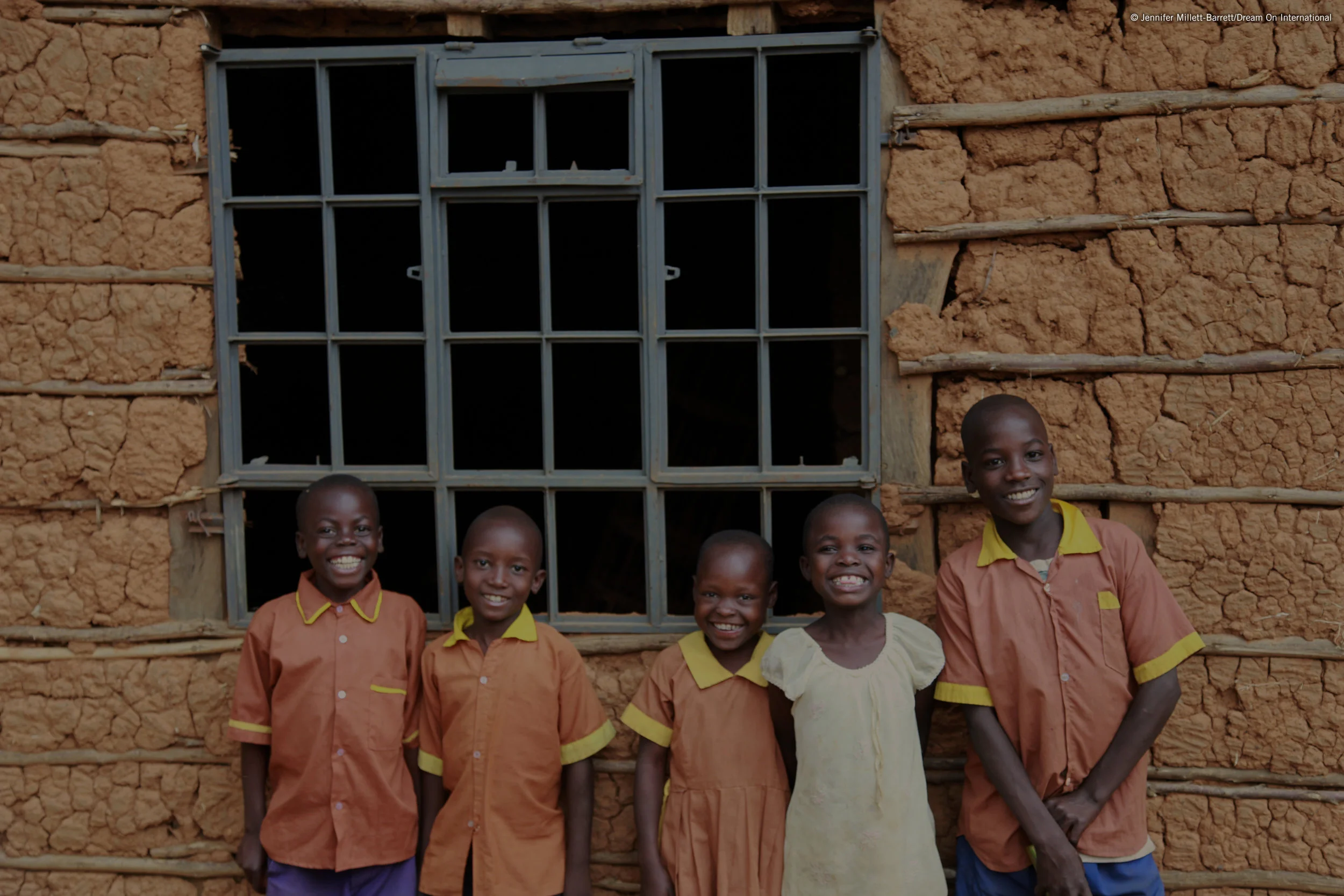kids in front of house2.jpg