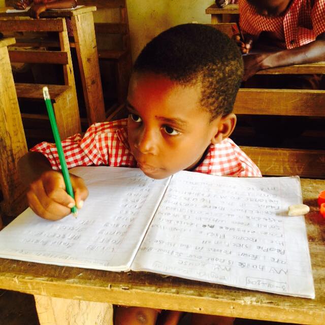 Boy writing in notebook.jpg