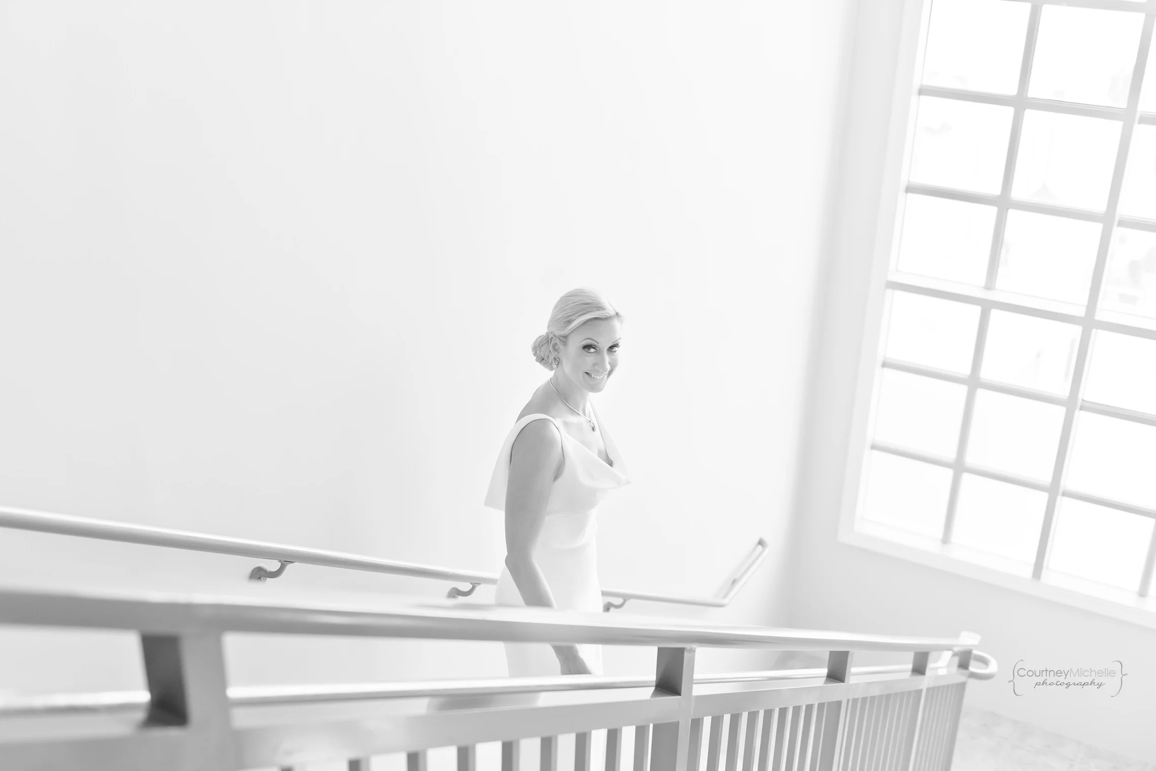 bride-in-staircase-ritz-carlton-grand-cayman-beach-wedding-photography-by-courtney-laper©CopyrightCMP-LeaAnneRaj-7614.jpg