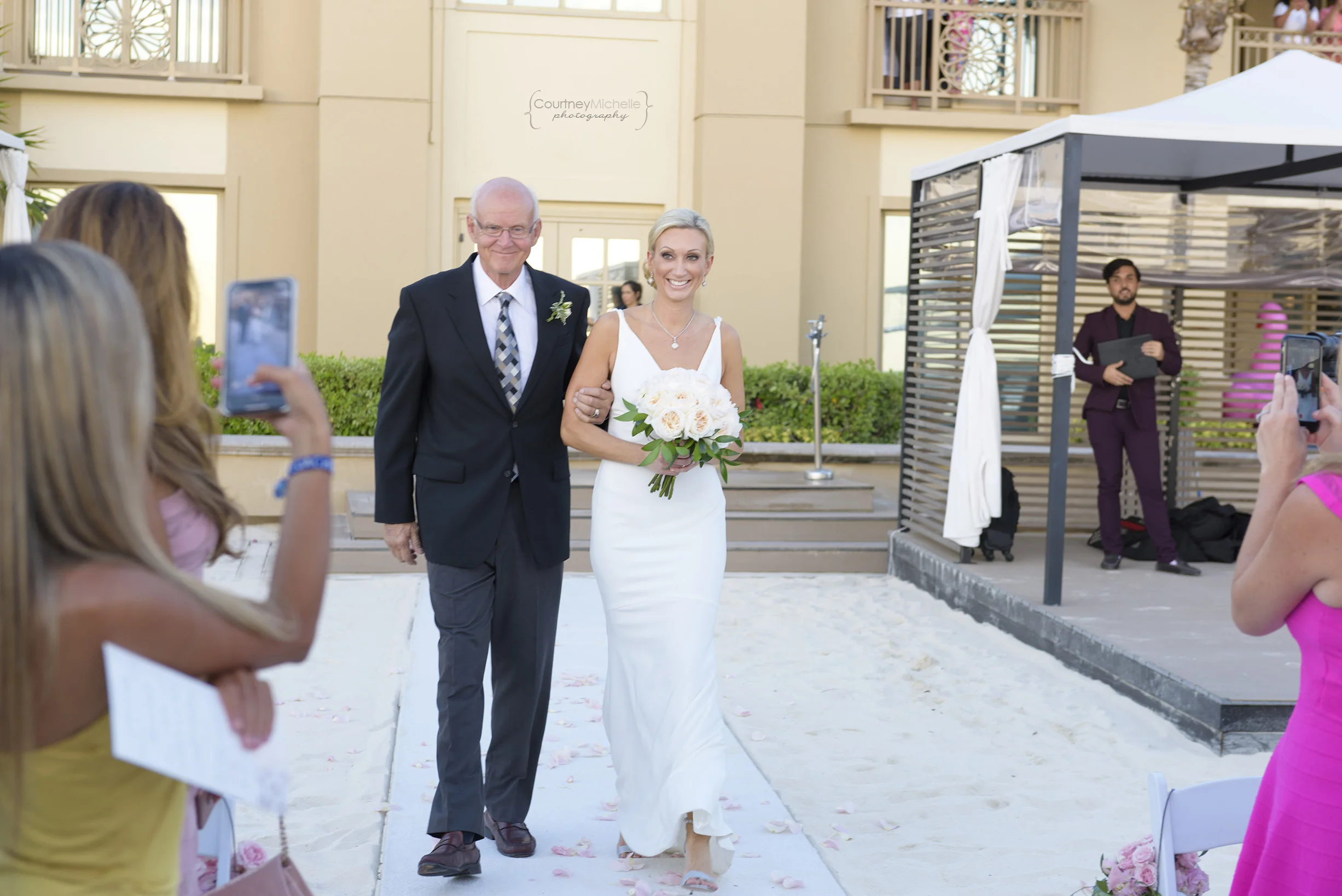 bride-walking-down-aisle-with-father-grand-cayman-beach-wedding-photography-by-courtney-laper©CopyrightCMP-LeaAnneRaj-7704.jpg