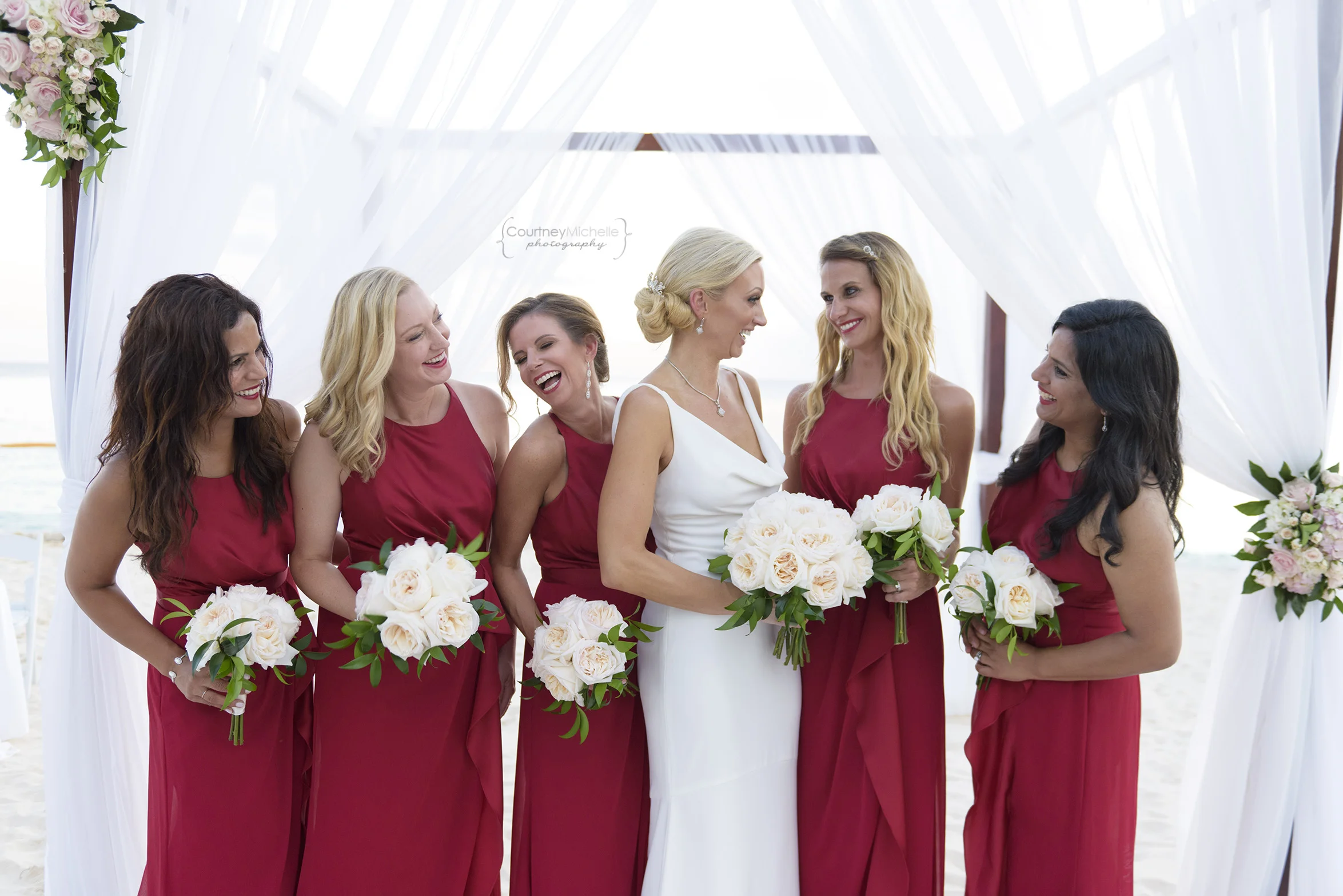 bride-and-bridesmaids-grand-cayman-beach-wedding-photography-by-courtney-laper©CopyrightCMP-LeaAnneRaj-7924.jpg