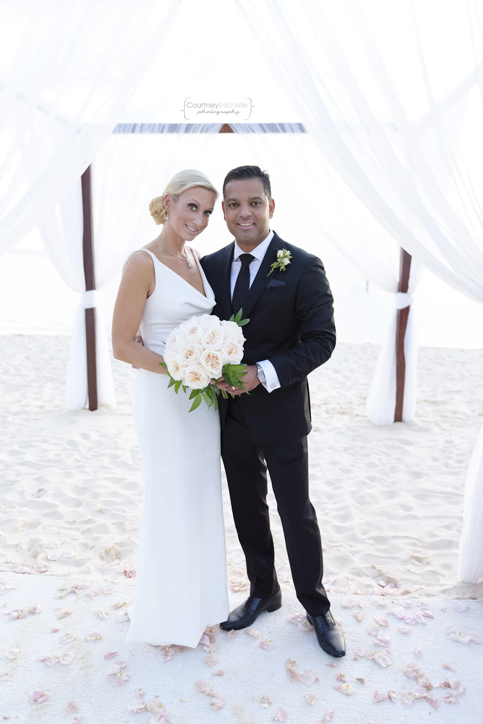 bride-and-groom-portrait-grand-cayman-beach-wedding-photography-by-courtney-laper©CopyrightCMP-LeaAnneRaj-8045.jpg