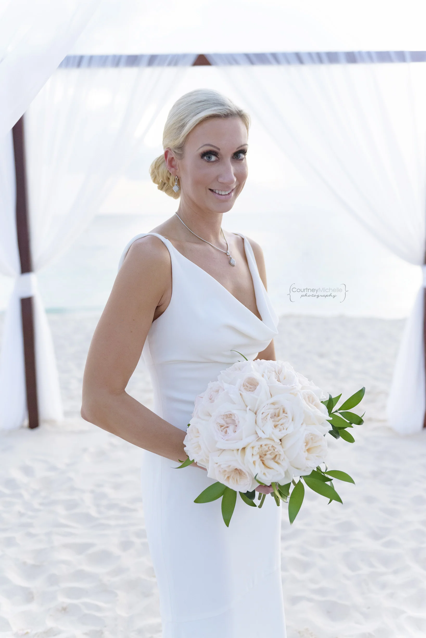bride-portrait-grand-cayman-beach-wedding-photography-by-courtney-laper©CopyrightCMP-LeaAnneRaj-8040.jpg