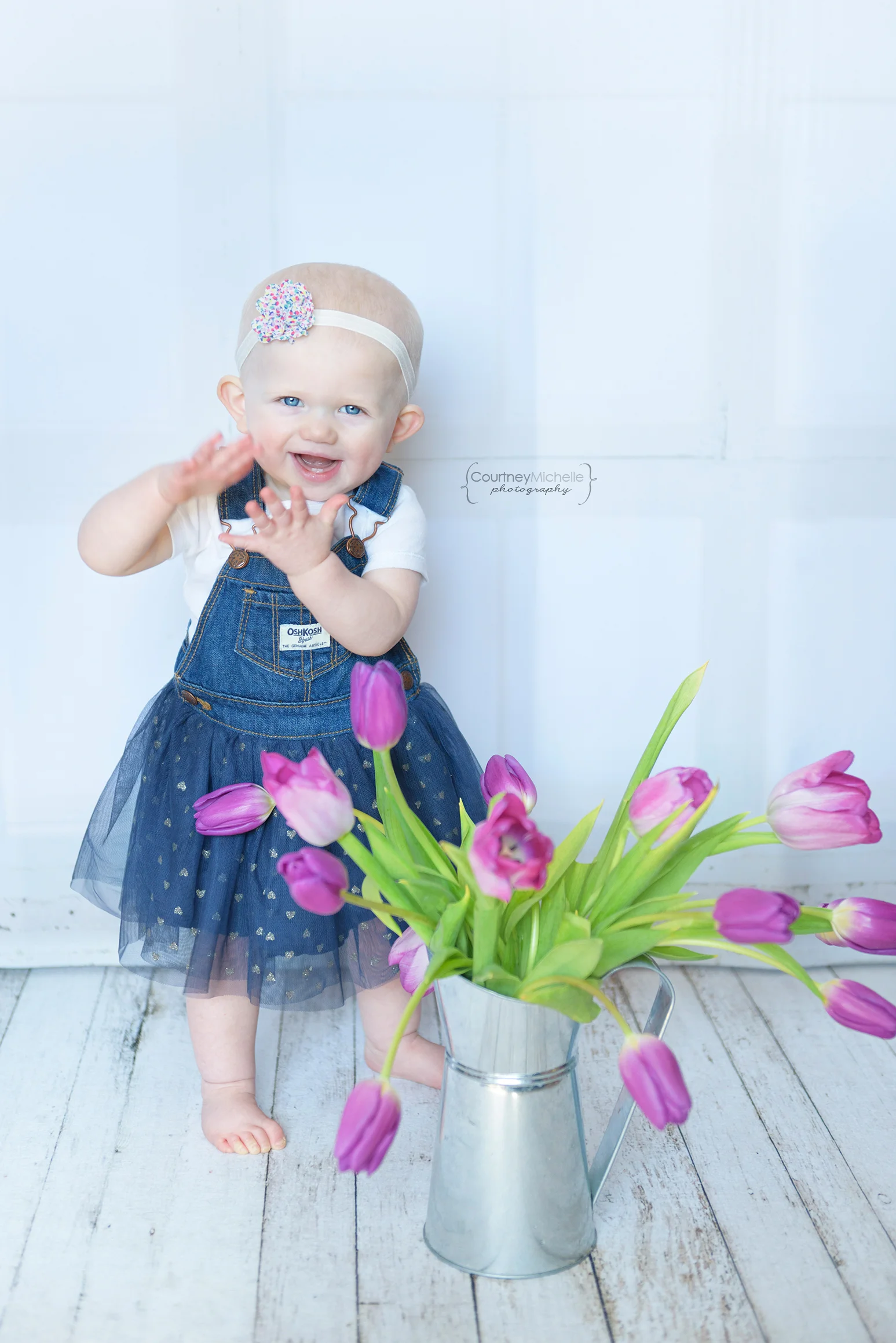 ©CourtneyMichellePhotography_spring_one_year_old_birthday_purple_tulips_2134.jpg