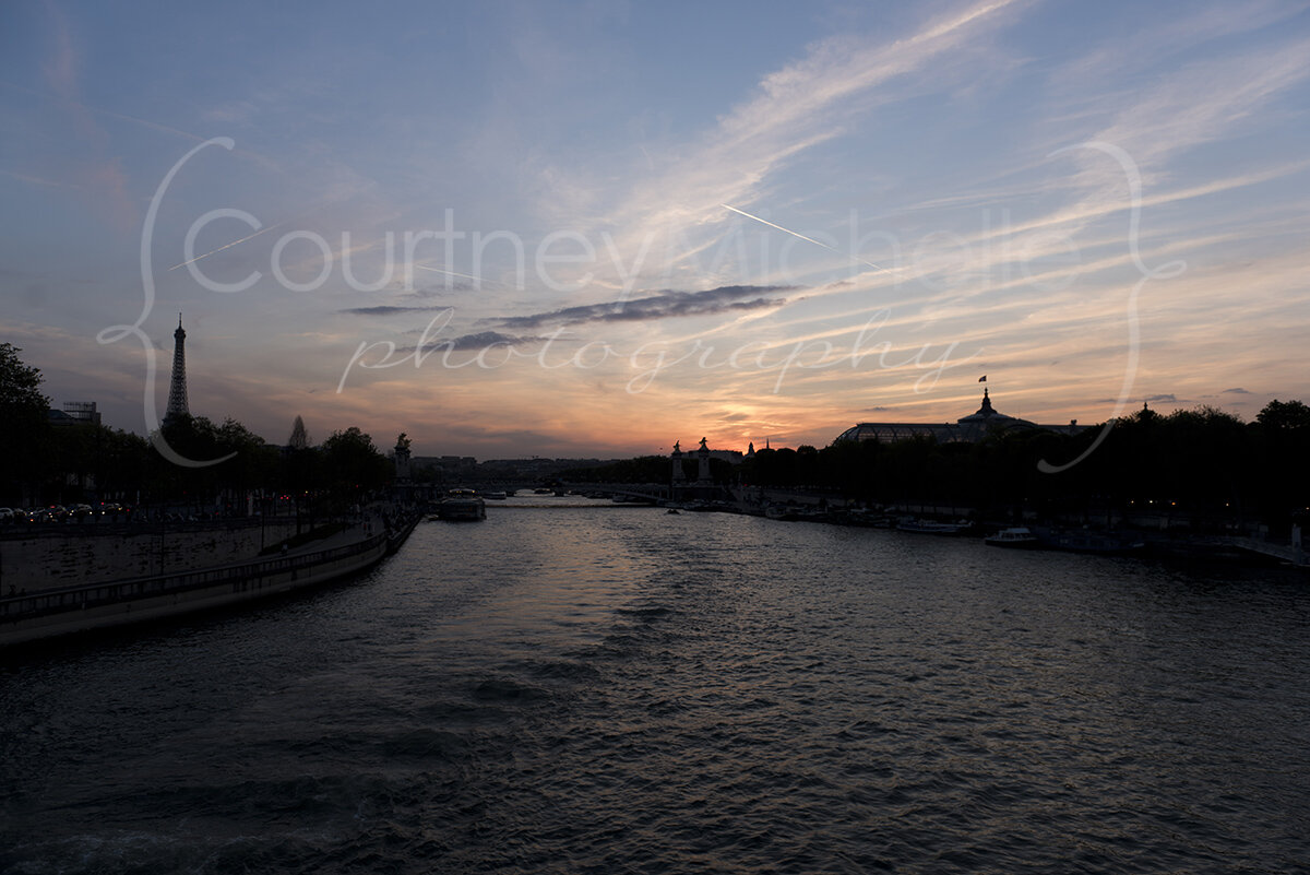the seine at sunset with the eiffel tower