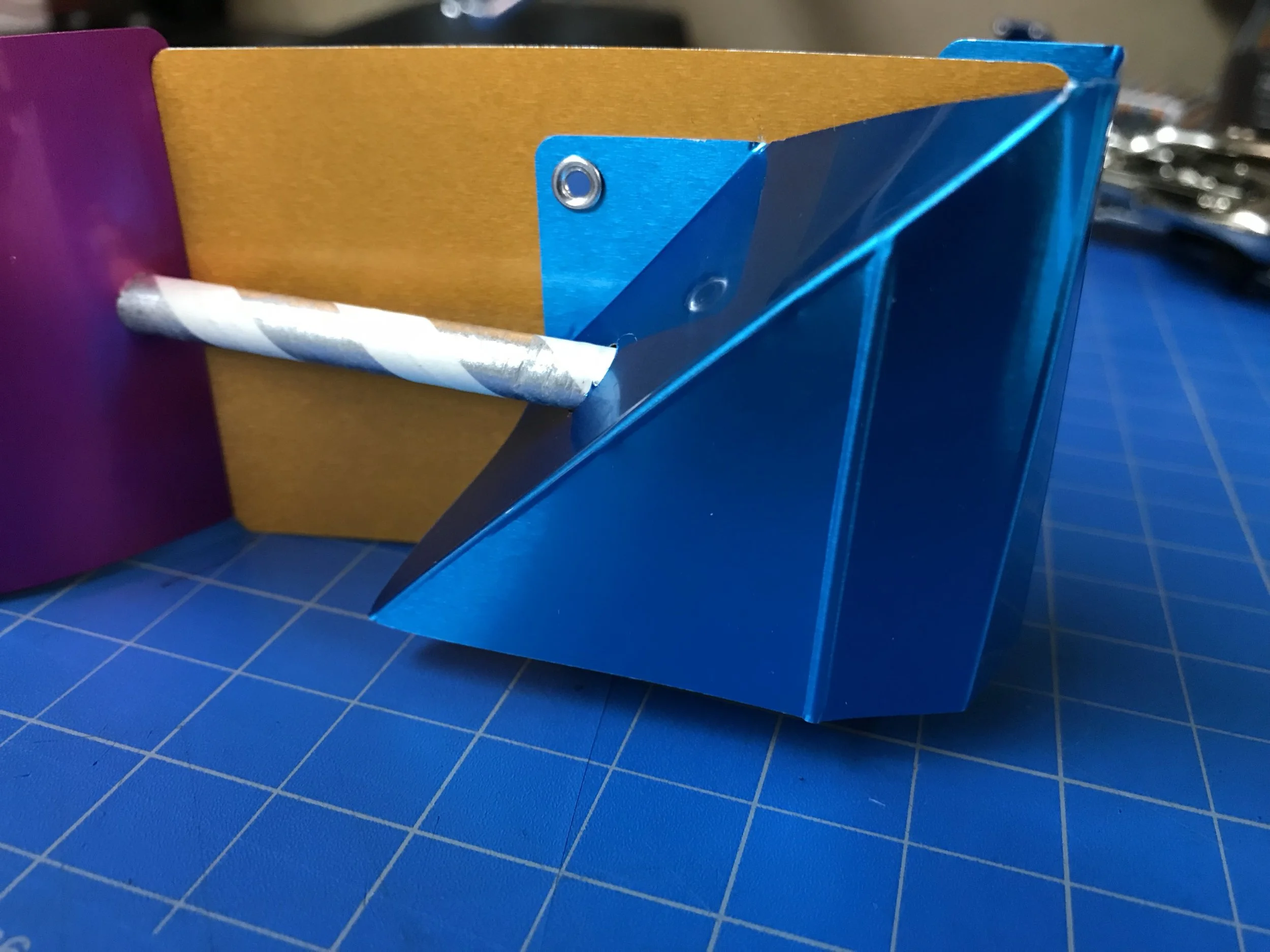 Creasing metal makes quick 3d forms from a 2d surfaces and creates a more rigid structure.