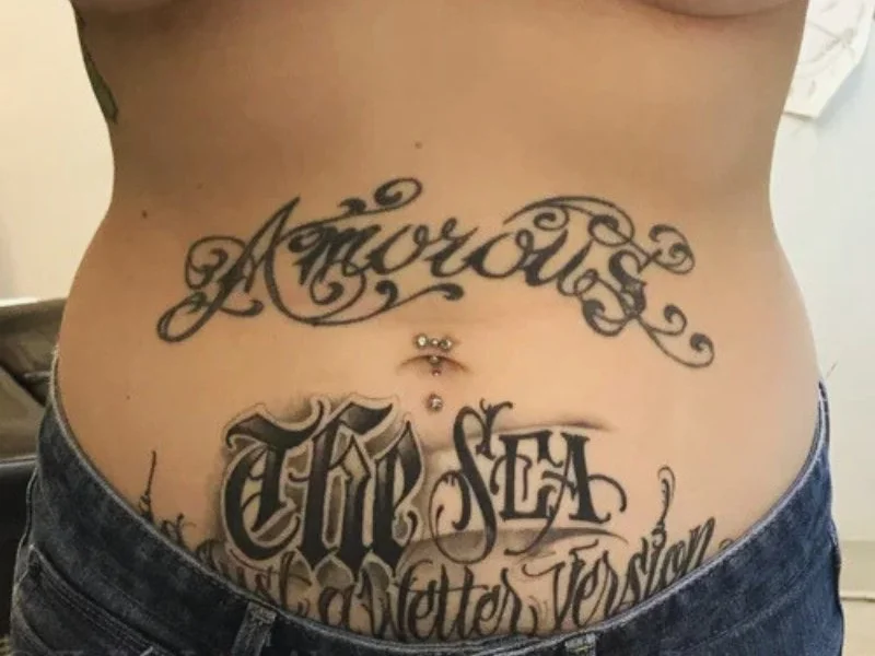 Stomach tattoo before cover up