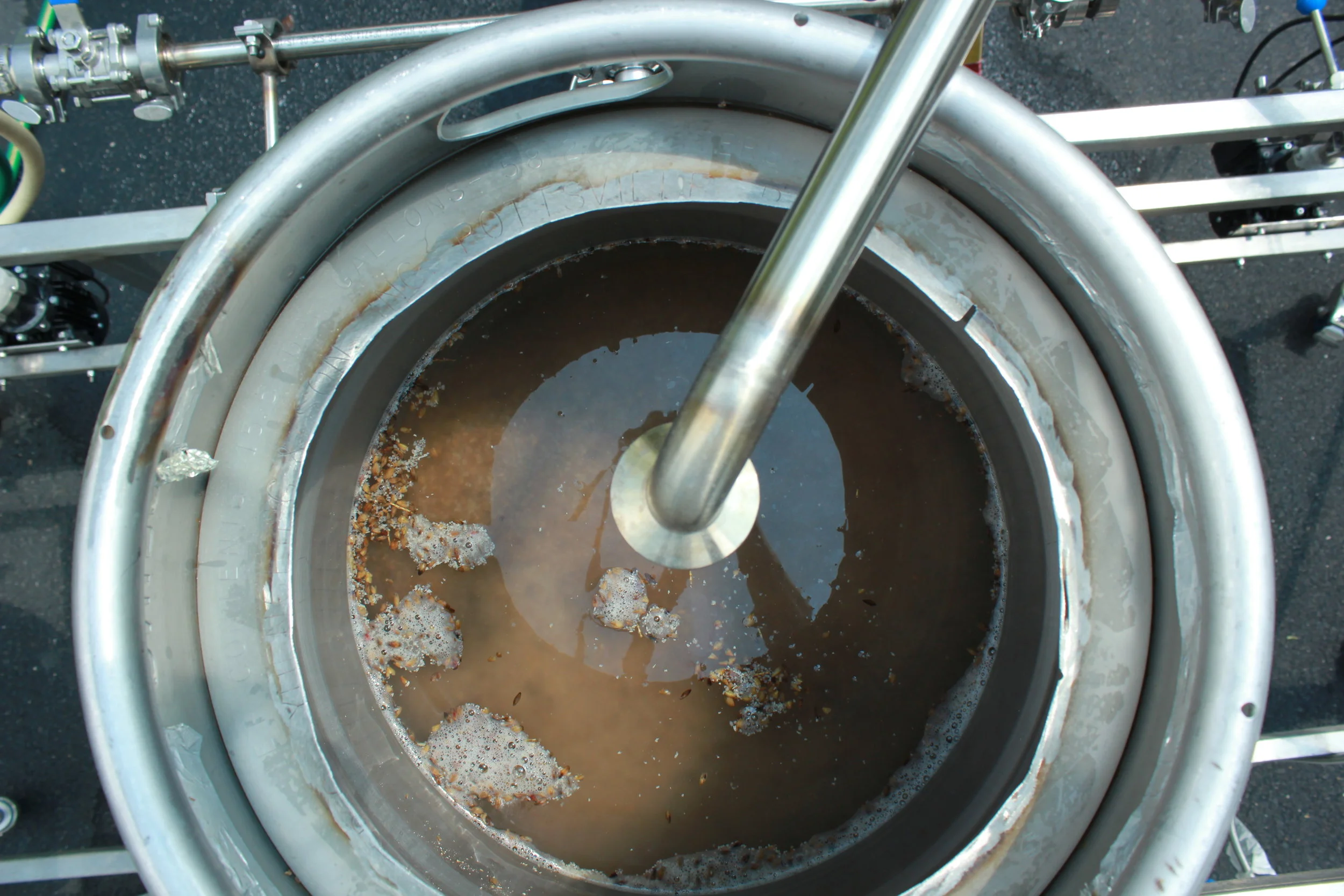 Lautering our wheat beer. (This is the one that didn't work out.)
