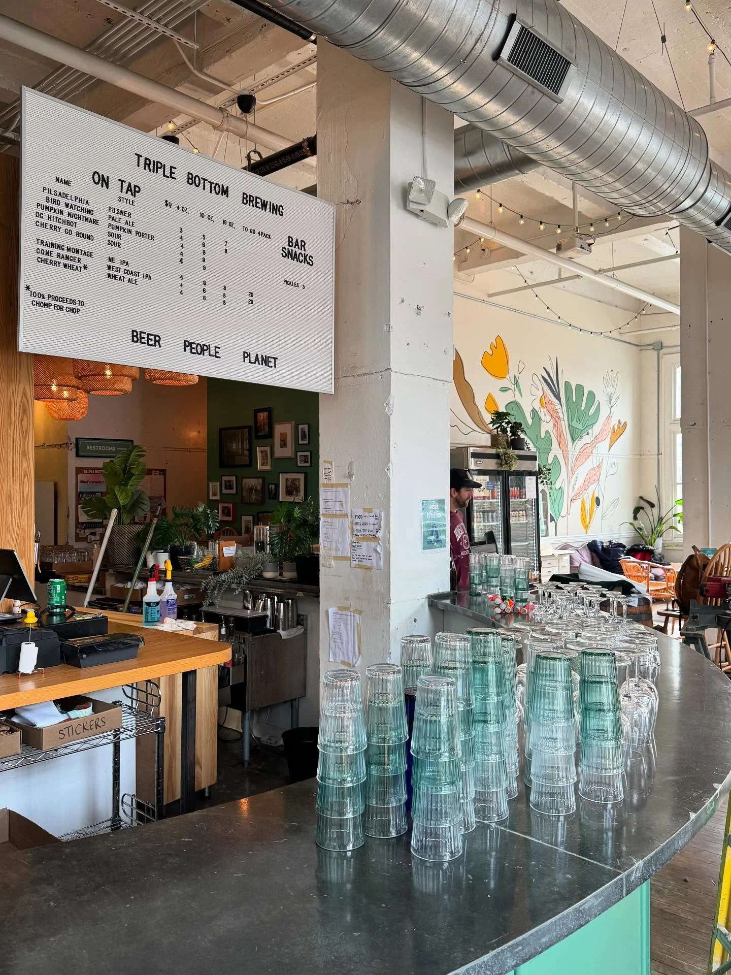 Contrary to the chaos in these photos, we are SO BACK!!! This past week we all got our hands dirty and gave the taproom a small face lift. Kerry mounted the projector the ceiling (TBB movie nights anyone? 👀), the walls got a fresh coat of paint, and