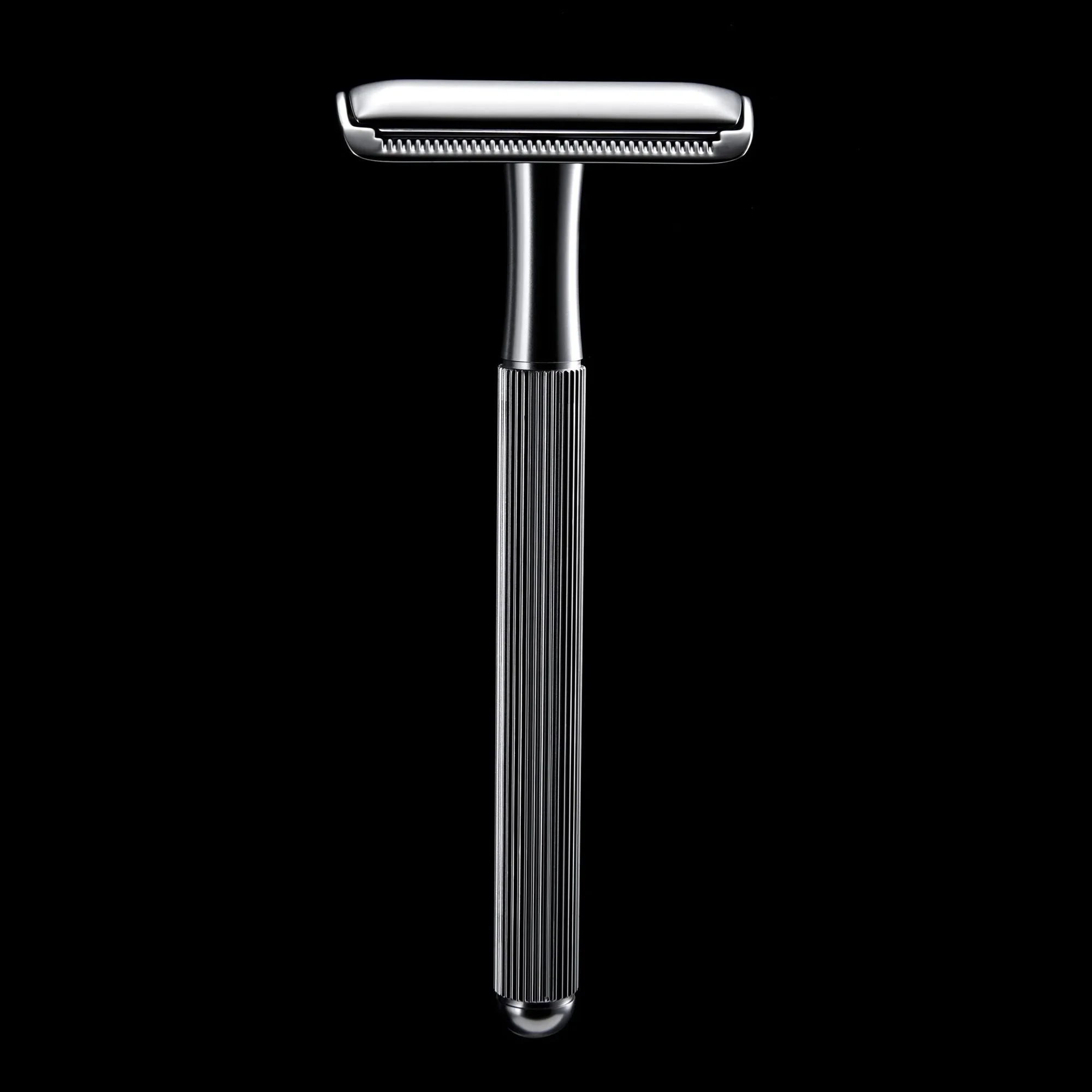 metal-safety-razor-black-background.jpg