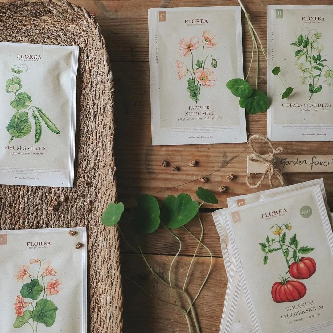 Florea seed packaging with hand-painted floral illustration