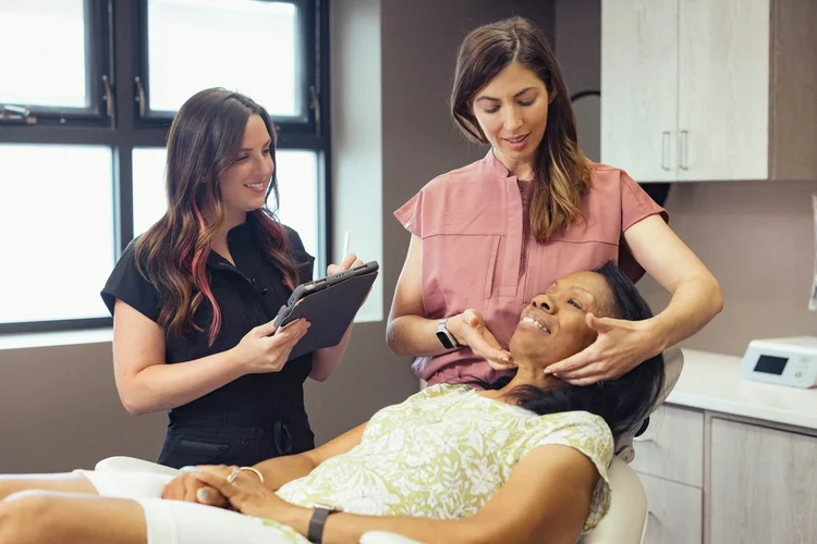 Healthcare photography of a medical team consultation with a patient
