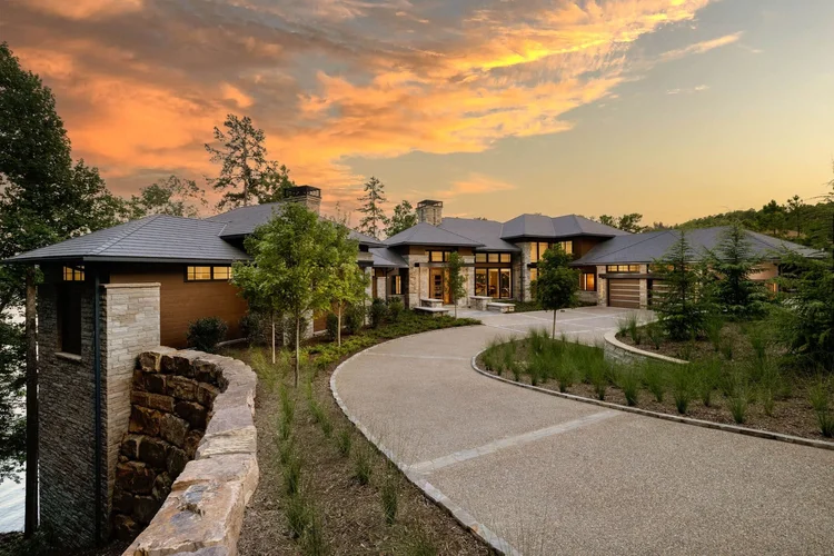 Twilight exterior of a custom home, built by Gabriel Builders (view 4).