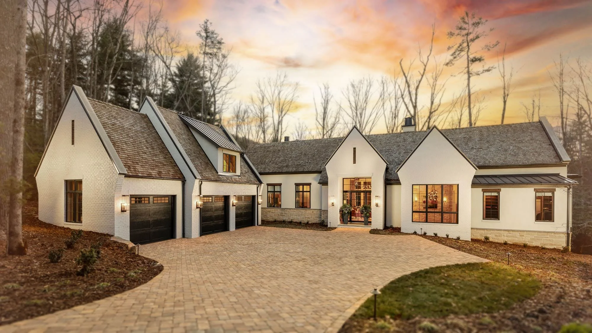 architectural image of exterior of luxury home at sunset