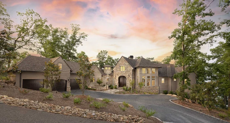 Residential architecture photography of Crystal Cove for Gabriel Builders, stone and siding home at sunset, Greenville SC