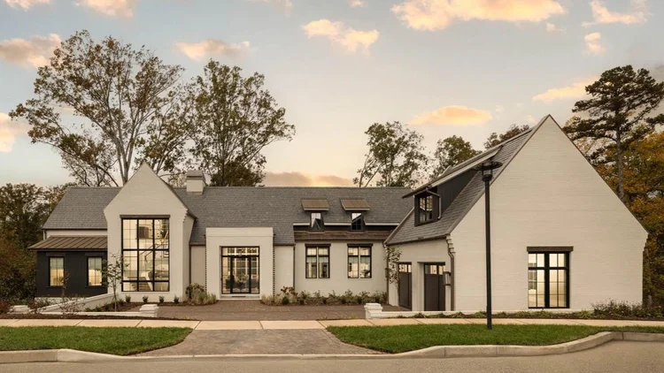 Luxury custom home exterior with white painted brick, residential architecture photography by Jack Robert Photo