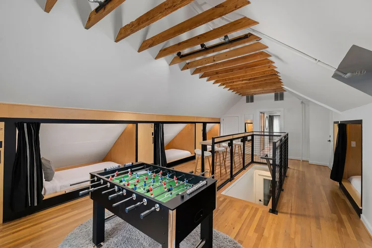 Interior of a bunk room in a commercial hospitality space — hospitality architecture photography by Jack Robert.