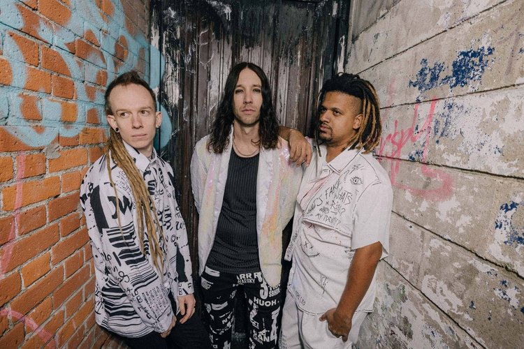 Band portrait in a brick alley, editorial music feature, Greenville SC