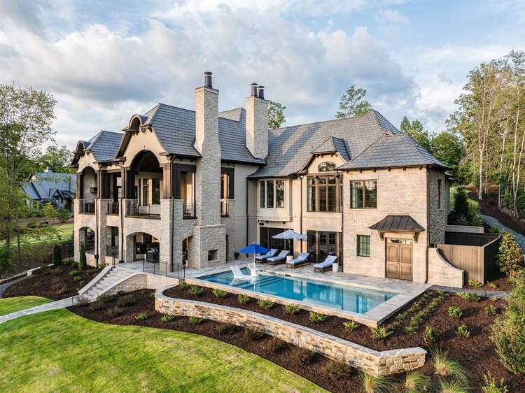 Aerial view of a custom home exterior, built by Gabriel Builders (view 5).