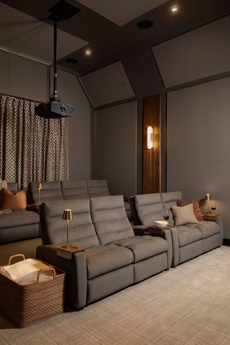 Home theater of a custom home, interiors by Northside Interior Design.